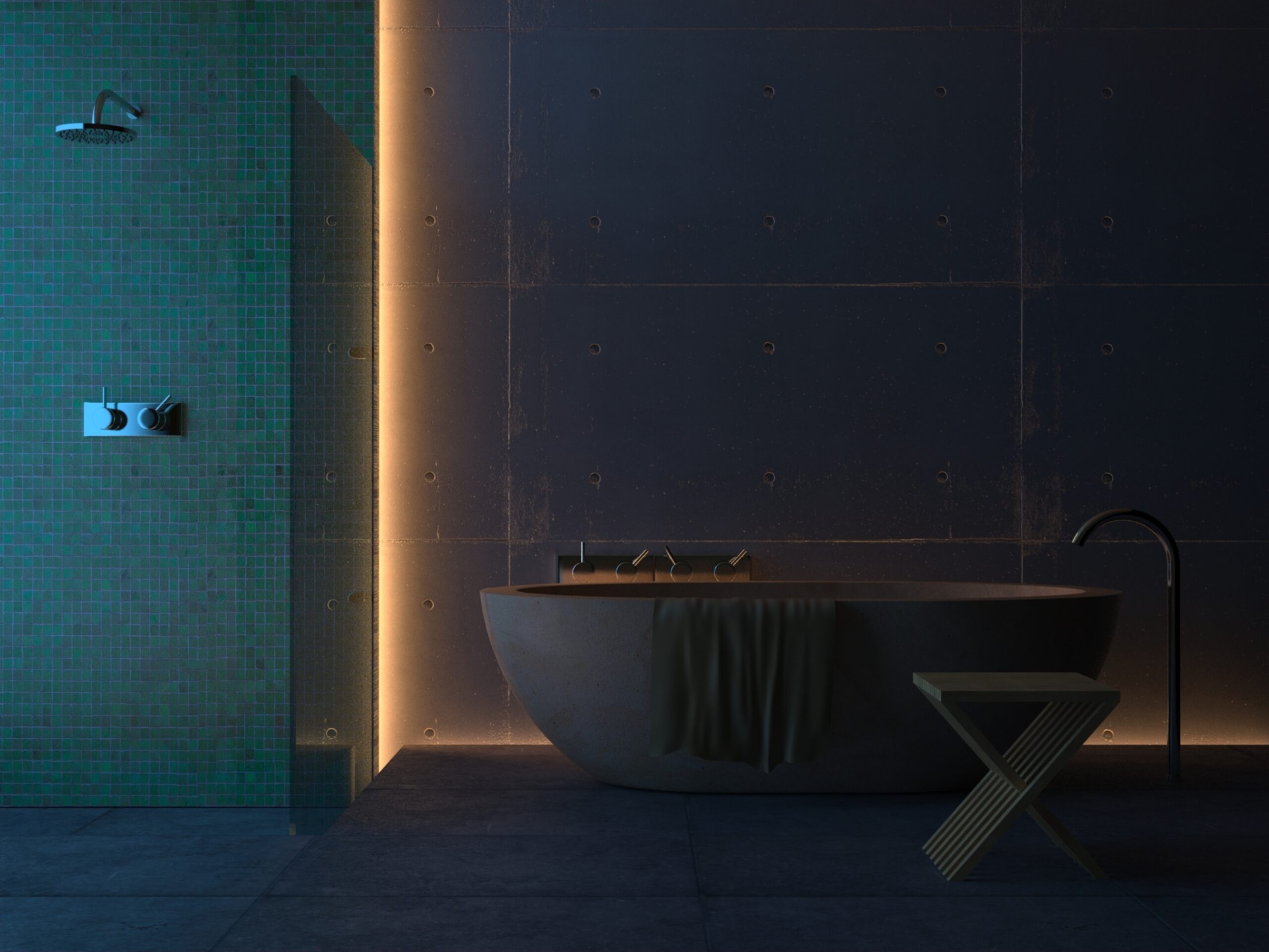 Integrated LED strip lighting along a wall edge in a modern bathroom creating a soft ambient glow behind a freestanding bath