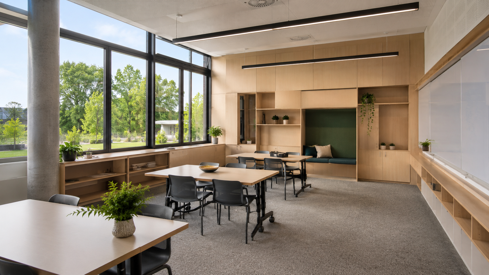 Modern classroom with large windows, natural daylight, suspended linear LED lighting, flexible learning furniture, indoor plants and human-centric educational design supporting student wellbeing and concentration.
