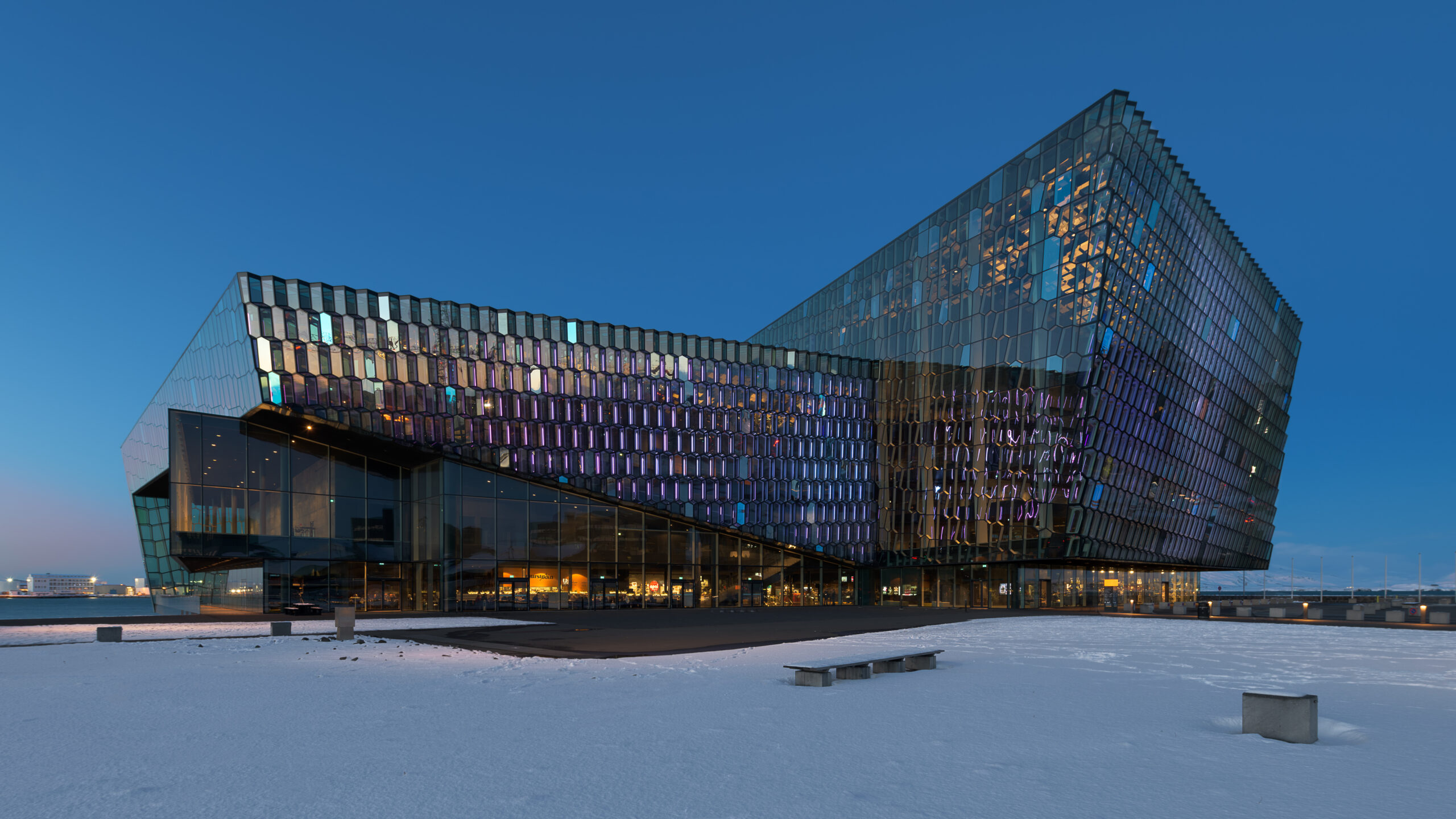 Harpa Concert Hall illuminated at dusk in Reykjavík
