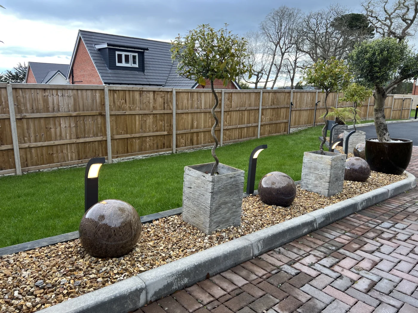 Contemporary garden pathway with integrated bollard lighting