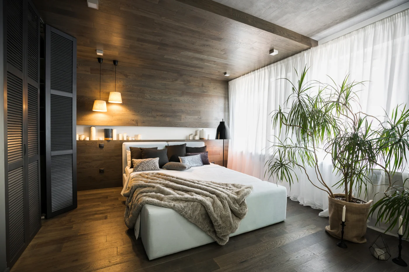 Modern bedroom with pendant bedside lighting