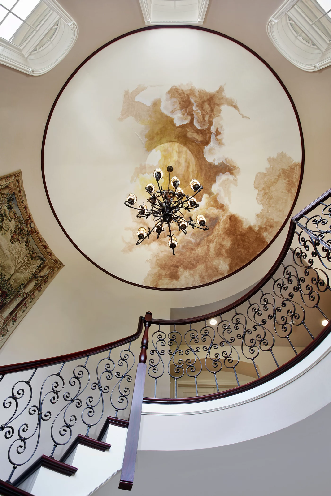 Ceiling art with black chandelier