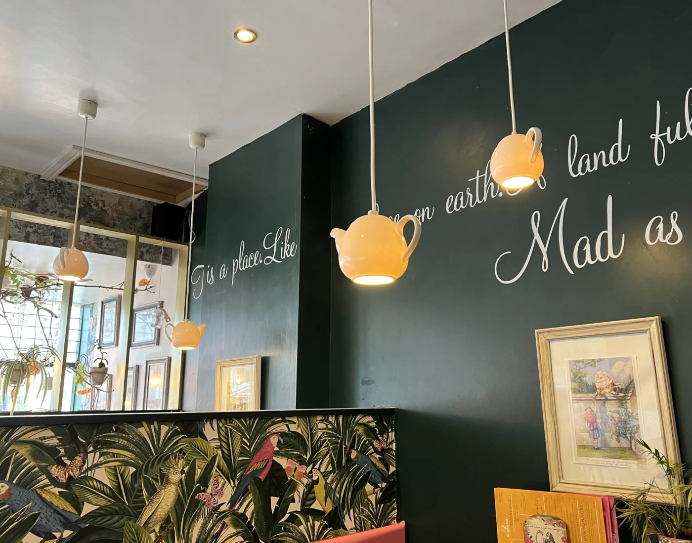 Creative teapot pendant lighting in café interior
