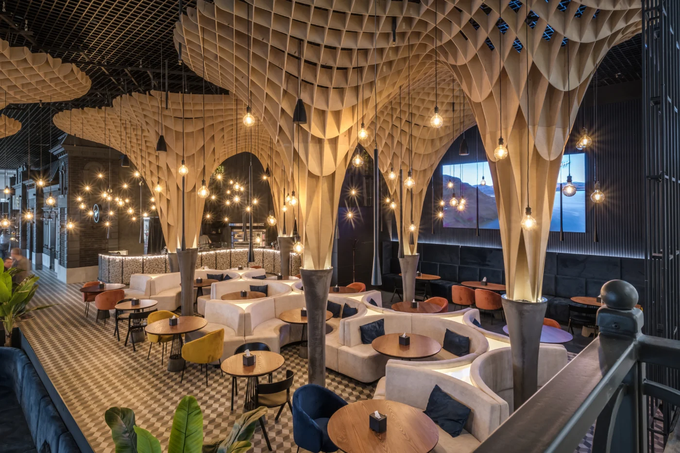 Sculptural lighting installation in modern restaurant interior